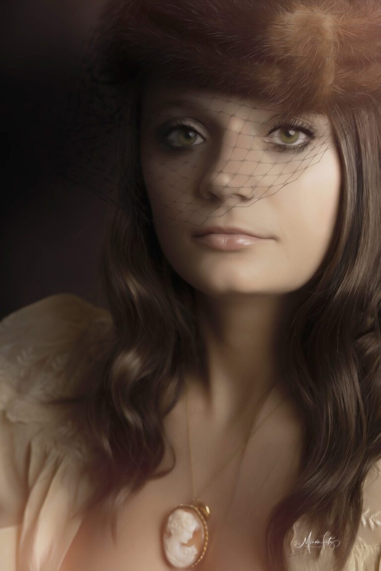 A close-up portrait of a woman with delicate makeup and soft lighting.